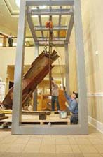 Hoisting steel member into display